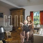 01-09-2004 Margreet Spijker at home in Hilversum , by order of Pulse Magazine.

[keywords]Living room, Baby, Smiling, TV Presentator[/keywords]